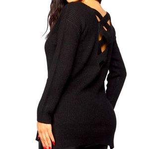 Black sweater with cross design on the back